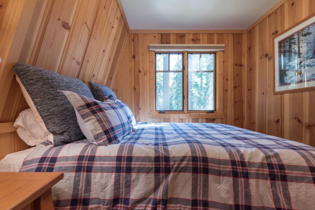 Wood cabin bedroom in Lake Tahoe cabin