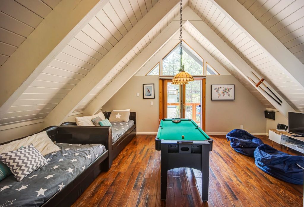 Game room and twin beds in a South Lake Tahoe airbnb