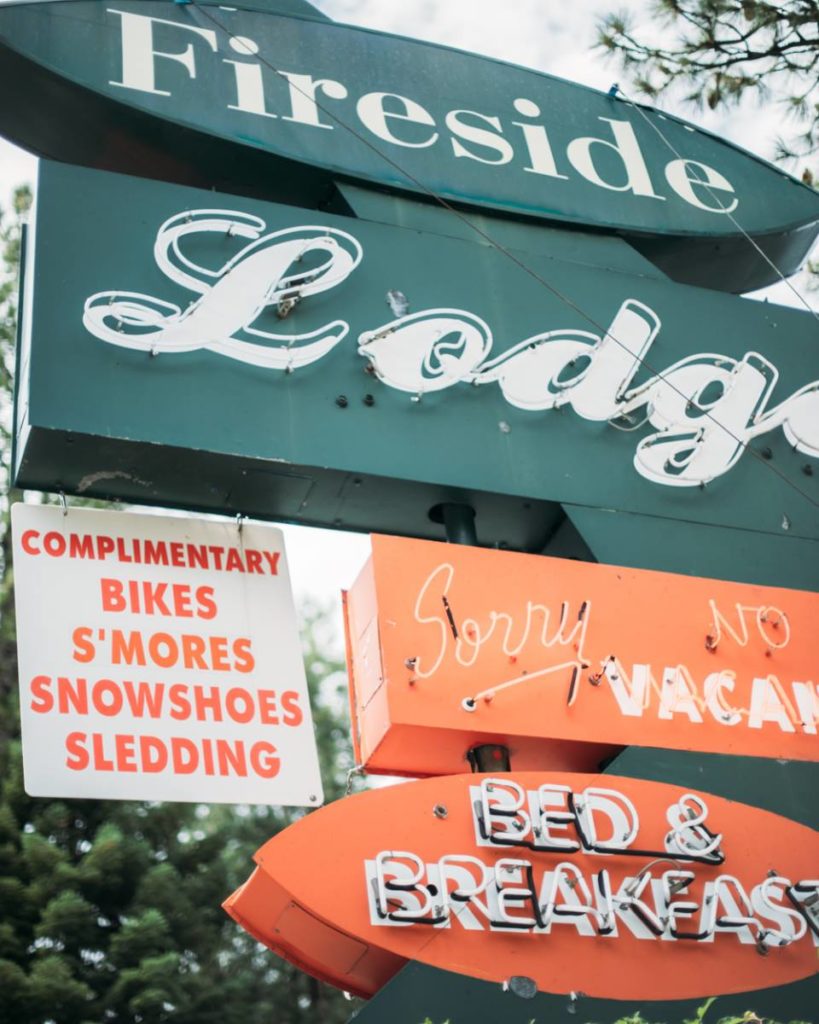 Fireside Lodge Sign: Complimentary bikes, s'mores, snowshoes and sledding