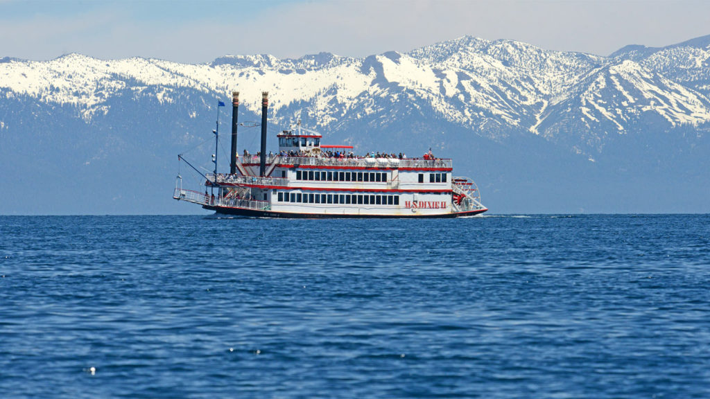 MS Dixie on the lake with snowy mountains backdrop