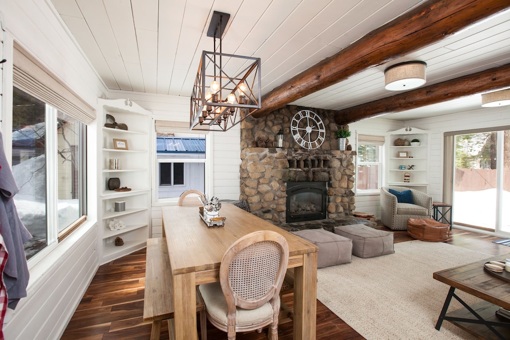 Rustic cottage living room with stone fireplace